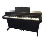 A Roland electric digital piano - model HP103e-RW, the seven octave keyboard in stained case. (55.