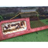 A Victorian cast iron agricultural hayheck and feeding trough, the rectangular wall mounting basin