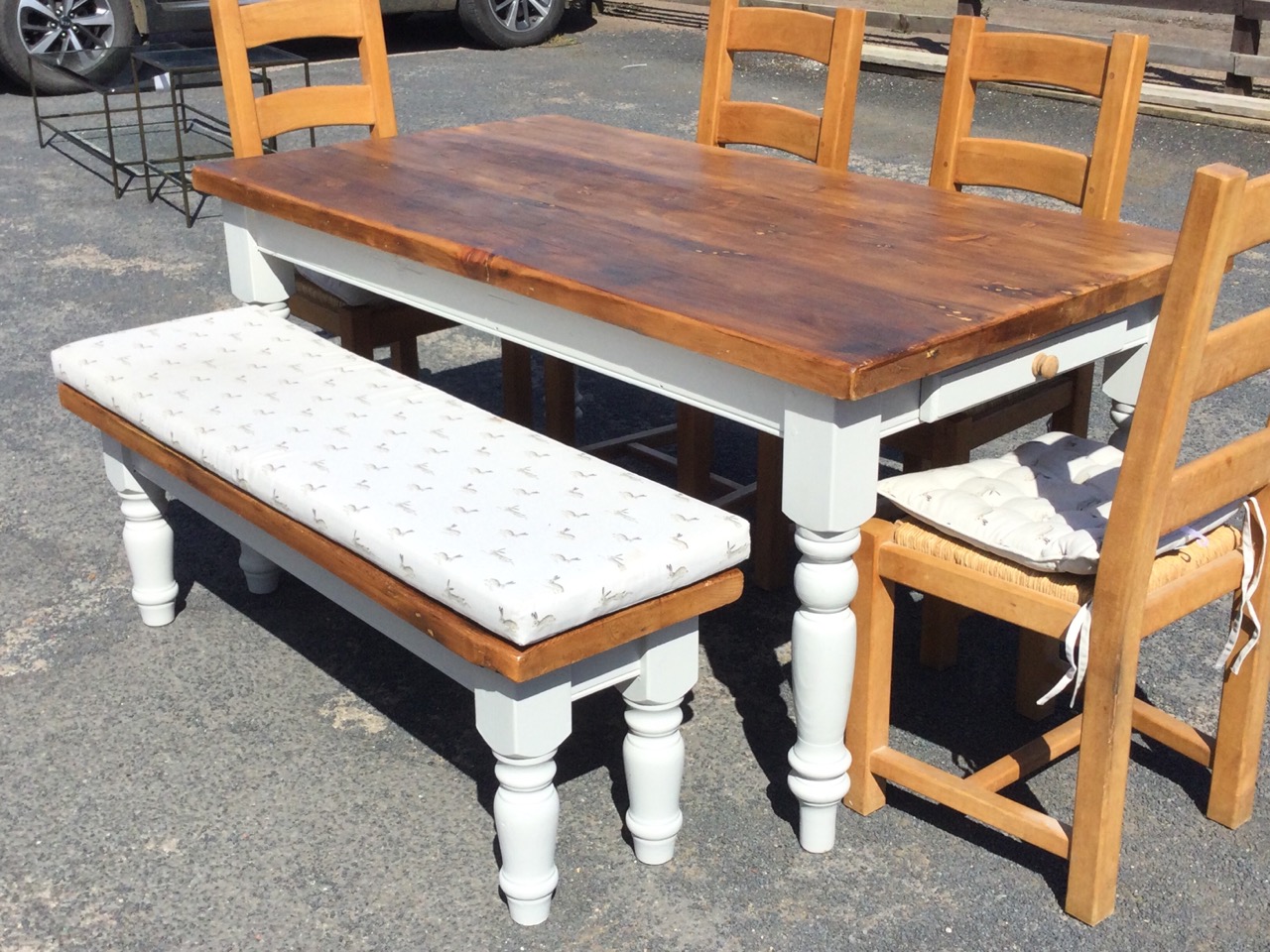 A reproduction painted kitchen table with four rush seated ladderback chairs & bench, the table on - Bild 2 aus 3