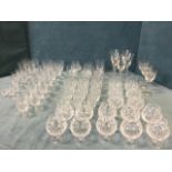 A quantity of drinking glasses with sets mainly by Stuart - wine, tumblers, flutes, brandy balloons,