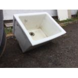 A rectangular butlers sink with angled front and cushion moulded rims. (23.75in x 20.5in x 15in)