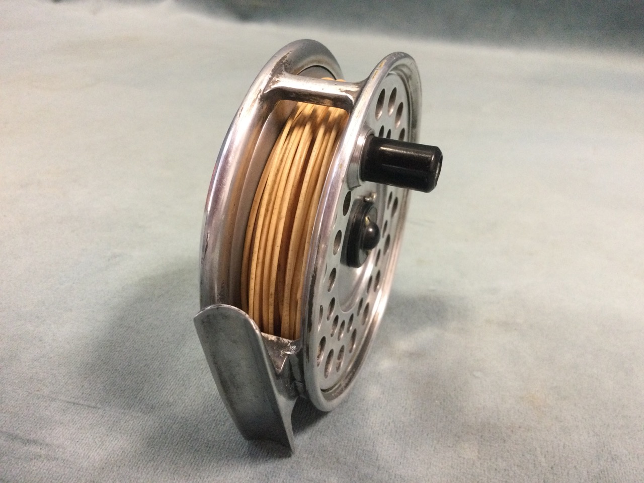 A Hardy Viscount 140 trout fly reel, the polished 3.5in drum fitted with a fly line.