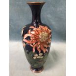 A Victorian tapering cloisonné vase with waisted neck, decorated with prunus blossom flowers and