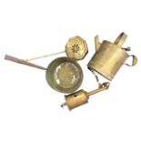 A Victorian brass watering can; a brass clockwork spit on chain; an octagonal brass chestnut