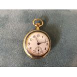 An 18ct gold ladies pocket watch with guilloche enamelled decoration, the circular enamelled dial