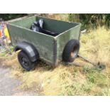 A single axel box trailer with angleiron frame, complete with spare tyre, electrics bar, and vinyl