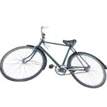 A Brooks old fashioned bicycle with sprung seat and lever brakes, moulded mudguards, etc.