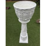 An Italian blanc-de-chine jardiniere on stand, the pot and base moulded with columns framing