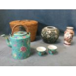 A cane cased Chinese tea-for-two set, with turquoise famille verte glazed teapot and pair of tea