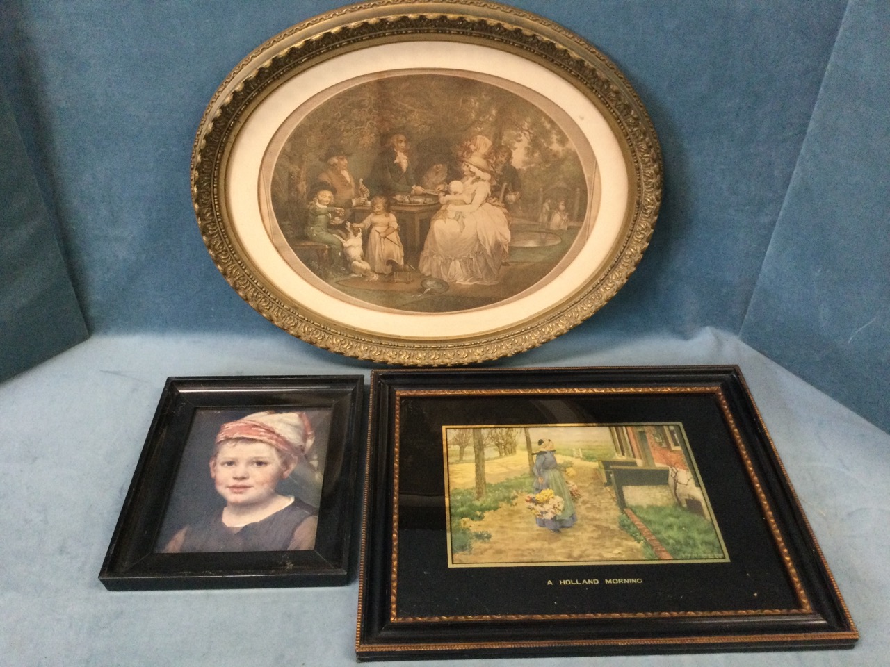 An oval nineteenth century print in leaf moulded gilt & gesso frame; a Dutch print titled A