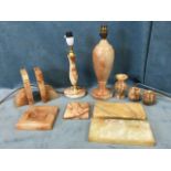 A married marble desk set with a pair of book-ends, paperweights, a pair of candleholders, a vase,