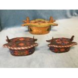 A graduated pair of nineteenth century oval Scandinavian folk tines, the handpainted boxes &