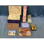 A box of miscellaneous games including card golf, pocket chess & chequers, a mah-jongg set with five