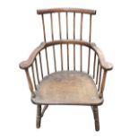 A nineteenth century oak country spindleback armchair, with smokers bow type arms on turned