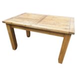 A rectangular oak kitchen table with cleated plank top on plain rails, supported on square column