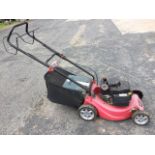 A Sovereign petrol rotary garden mower with grass box. (A/F)