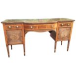A nineteenth century mahogany sideboard with plate glass to top, the drawers and cupboards all