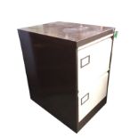 A modern two-drawer metal filing cabinet, complete with key. (18in x 24.5in x 29in)