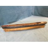 An antique wood model boat with solid hardwood hull - A/F. (32.75in)