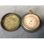 A Victorian leather cased pocket barometer by Steward of The Strand, London, the silvered dial