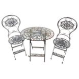 A folding garden table & chair set, the oval table with foliate pierced grill decoration to top