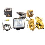 An electric power transformer, with a quantity of cables, a floodlight, an AEG power drill, etc. (