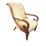 A Victorian mahogany armchair with button upholstered back in moulded frame, the arms with padded
