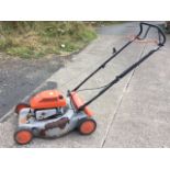A Flymo Electrolux rotary garden mower, the machine with Briggs & Stratton engine - A/F.