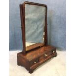A Georgian mahogany dressing table mirror with rectangular moulded frame on tapering supports
