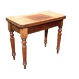 A Victorian mahogany turn-over-top tea table, the twin top swivelling above a plain frieze, raised