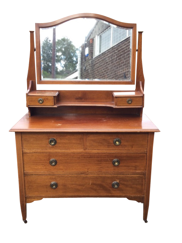 An Edwardian mahogany dressing table inlaid with chequered banding, the arched bevelled mirror above