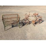 An antique rectangular wrought iron brazier, the basket with slim riveted spindle bars on