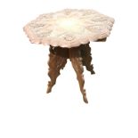 An eastern carved scalloped top coffee table, the finely detailed top with leaf lotus panels framing