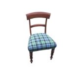 A single Victorian mahogany chair with curved bar back above a tartan upholstered seat, raised on