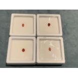 Four individually boxed loose fire opals, two pear-cut and two marquee-cut. (4)