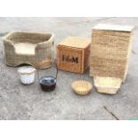 Various cane baskets including a dog bed, a Fortnums hamper, a rush laundry bin, small baskets, etc.