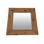 A square contemporary mirror in wide pine frame. (27.5in x 27.5in)