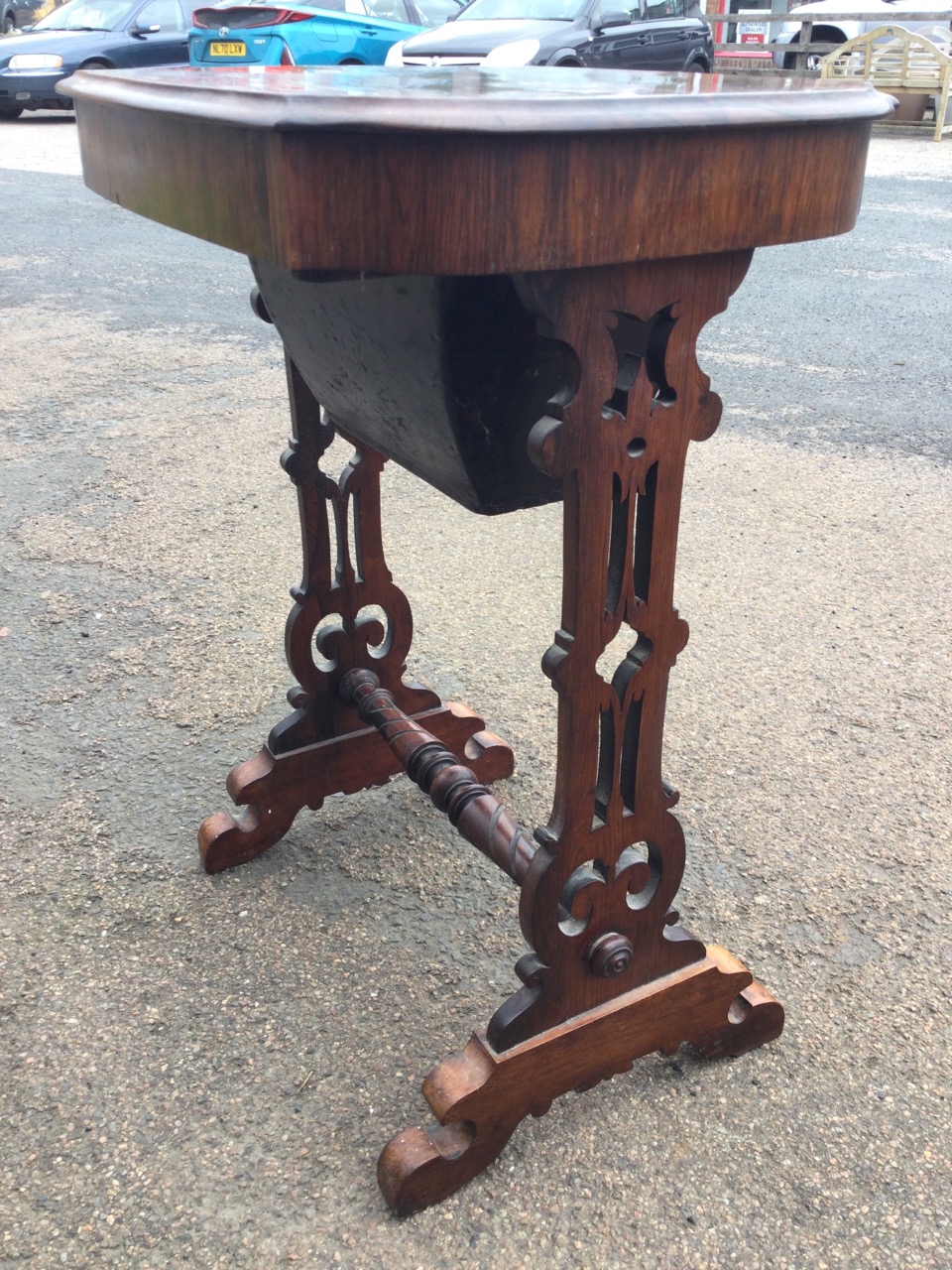 A Victorian rosewood sewing table, the shaped moulded top having frieze drawer with fitted well, - Image 3 of 3