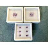 A pair of boxed square cut pink amethysts, each of 2.6 carats; and boxed set of six similar coloured