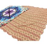 A patchwork quilt sewn with a central cobweb and flowerhead design - 74in x 84in; and a contemporary