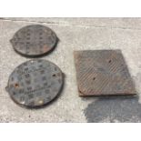 A Hepworth square cast iron drain cover in frame - 20.5in x 20.5in; and a pair of circular Marley