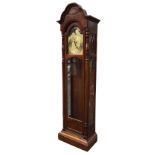 An American mahogany longcase clock by Sligh of Michigan, the arched hood applied with carved
