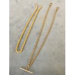 A 9ct gold albert chain with T bar and twin links to two lengths; and a twisted Italian 9ct gold