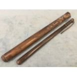 A leather cased nineteenth century hardwood truncheon, the tapering batton with ribbed handle in