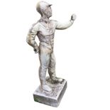 A composition figure of a jockey, the capped young rider holding up his hand, mounted on rectangular