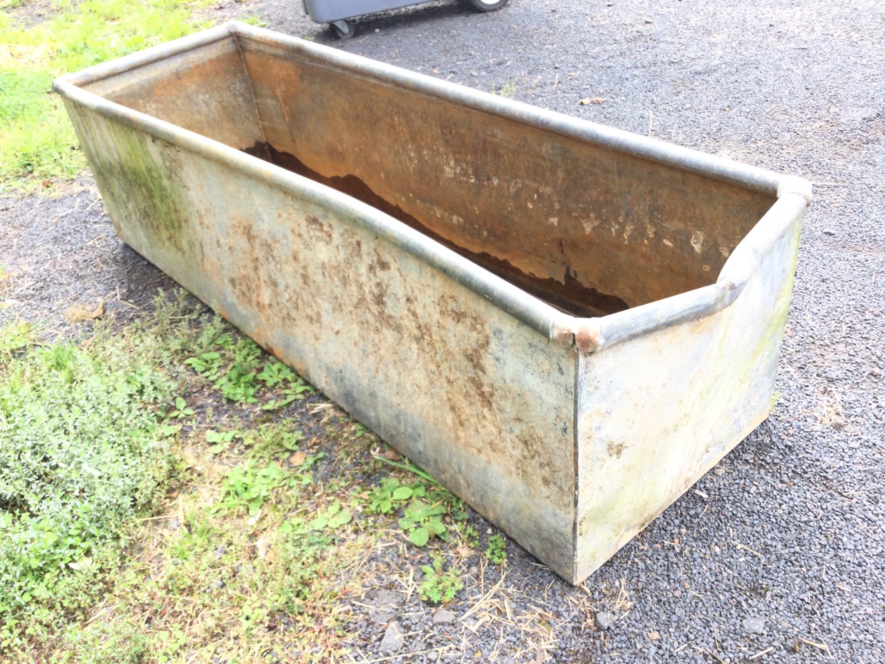 A rectangular galvanised trough with tubular rim. (62in x 19.25in x 16.25in) - Image 3 of 3