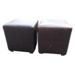 A pair of square leather American pouffes, the panelled cubes on block feet. (16in x 16in x 16in) (
