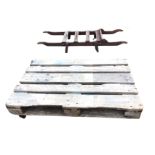 A painted Edwardian railway station porters luggage stand, with slatted platform and shaped ash