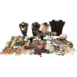 The residual contents of a jewellery stall including neck display boards, bangles, necklaces, beads,