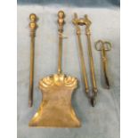 A married set of brass fire irons - shovel, poker, tongs & grips. (4)